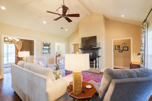 4773 Pawnee Dr, Hahira, GA 31632 - living area featuring healthy amount of natural light, dark wood-style flooring, beamed ceiling, a chandelier, and high vaulted ceiling