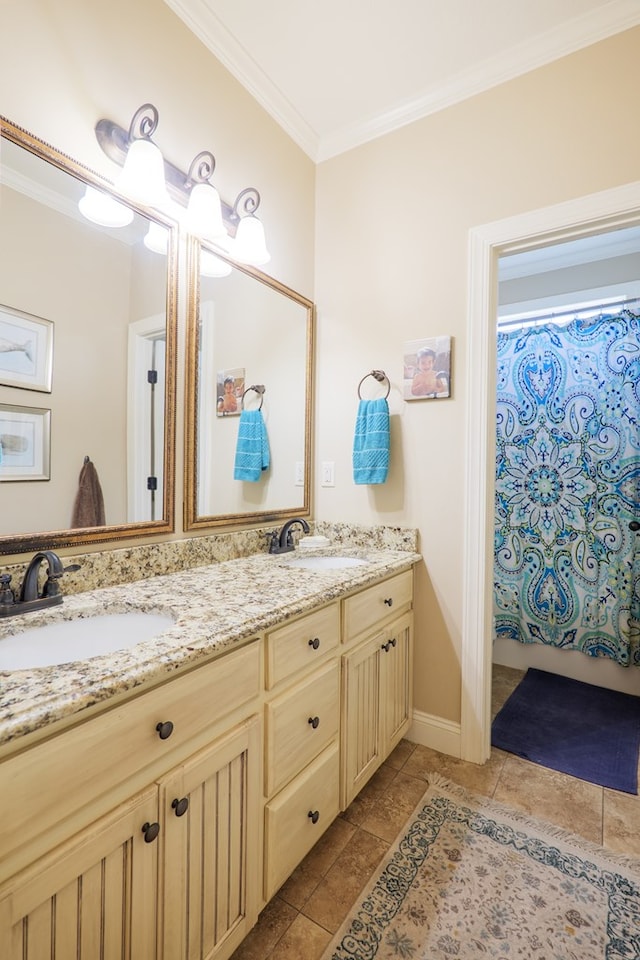 4773 Pawnee Dr, Hahira, GA 31632 - bathroom with crown molding, double vanity, tile patterned flooring, and baseboards