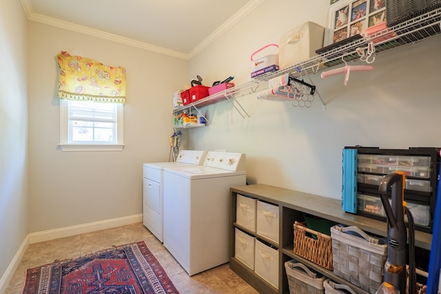 4773 Pawnee Dr, Hahira, GA 31632 - laundry area featuring washing machine and dryer, crown molding, and baseboards