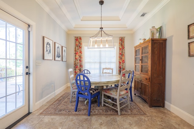 4773 Pawnee Dr, Hahira, GA 31632 - dining space with plenty of natural light, a raised ceiling, ornamental molding, and baseboards