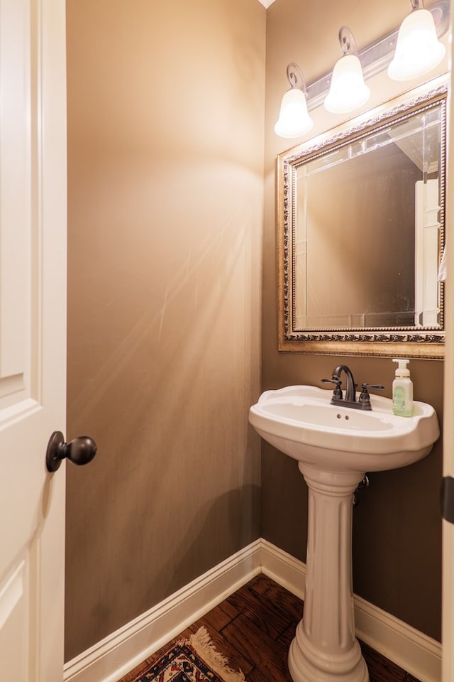 4773 Pawnee Dr, Hahira, GA 31632 - bathroom with wood finished floors and baseboards