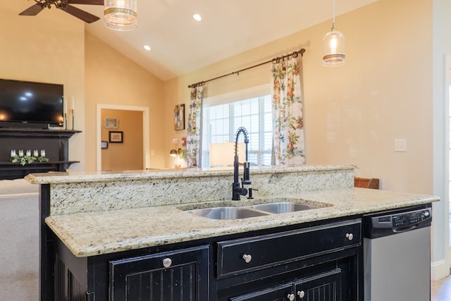 4773 Pawnee Dr, Hahira, GA 31632 - kitchen with dark cabinets, dishwasher, a sink, ceiling fan, and lofted ceiling