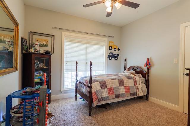 4773 Pawnee Dr, Hahira, GA 31632 - carpeted bedroom featuring baseboards and a ceiling fan