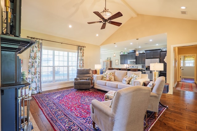 4773 Pawnee Dr, Hahira, GA 31632 - living room featuring ceiling fan, beamed ceiling, wood-type flooring, high vaulted ceiling, and recessed lighting