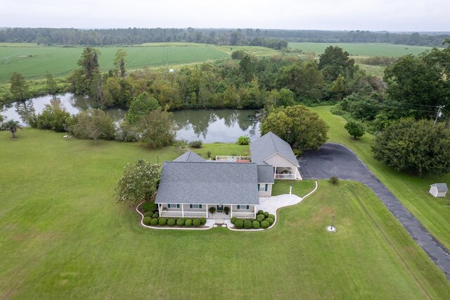 drone / aerial view with a rural view and a water view