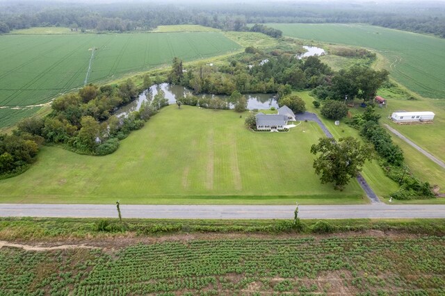 aerial view featuring a rural view and a water view