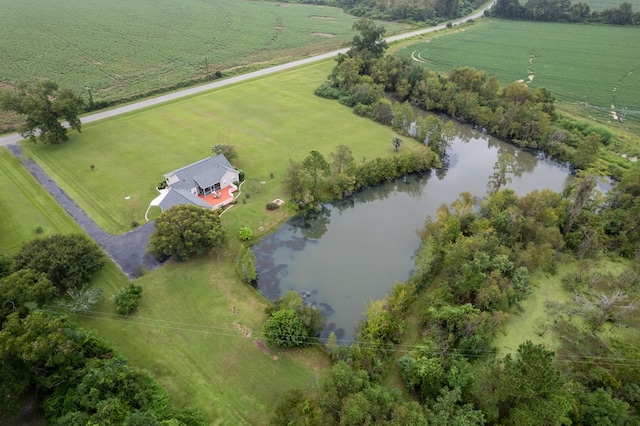 bird's eye view with a rural view and a water view