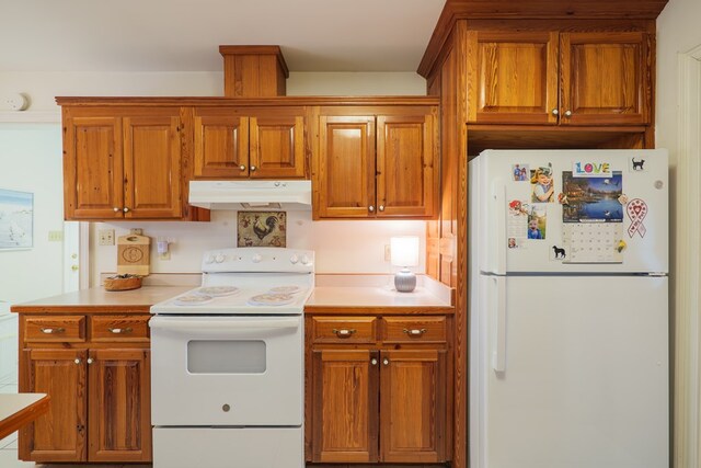 kitchen featuring white appliances