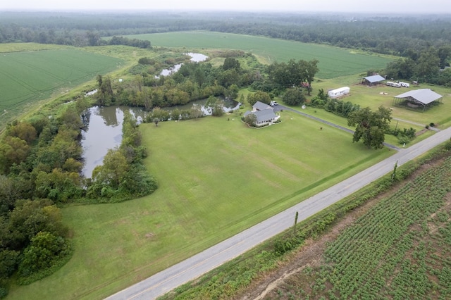 aerial view with a rural view and a water view