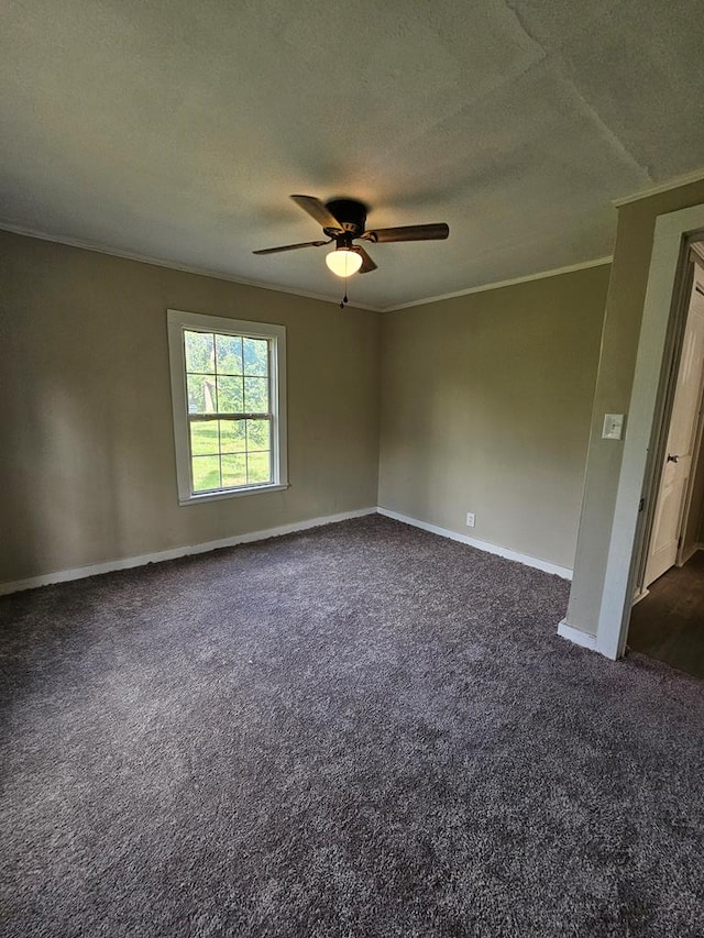 2105 N Troup St, Valdosta, GA 31602 - unfurnished room featuring ornamental molding, dark carpet, ceiling fan, and a textured ceiling
