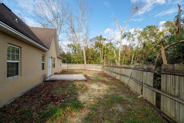 view of yard with a patio area