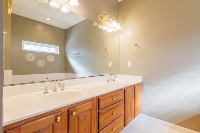 bathroom with tile patterned flooring and vanity