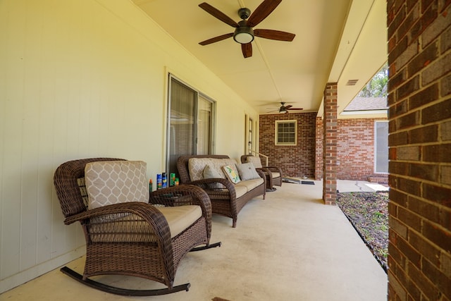 view of patio featuring a ceiling fan and visible vents