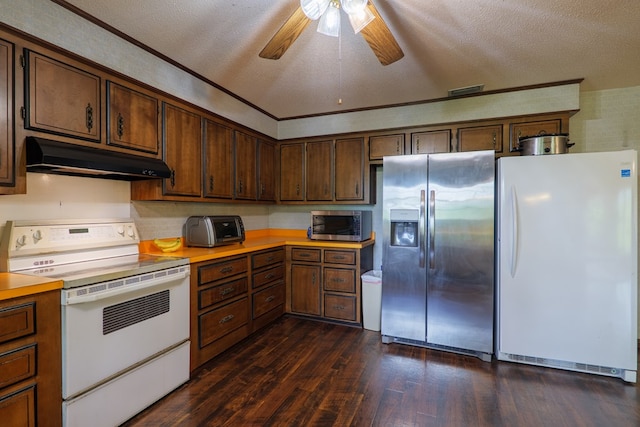 kitchen with under cabinet range hood, light countertops, appliances with stainless steel finishes, and dark wood-style floors