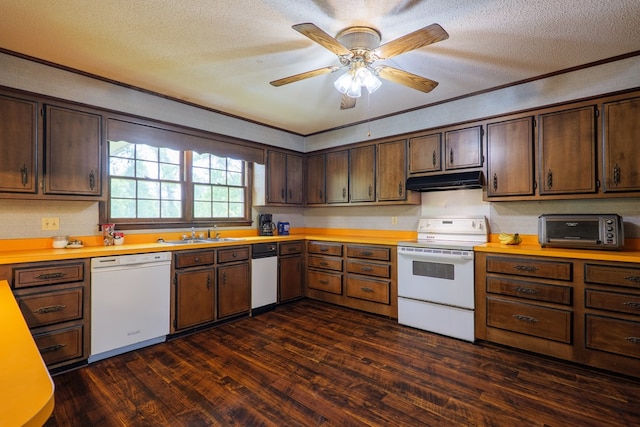 kitchen with white appliances, a textured ceiling, a toaster, under cabinet range hood, and dark wood-style flooring