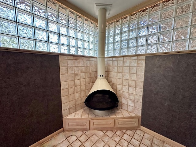 bathroom with tile walls