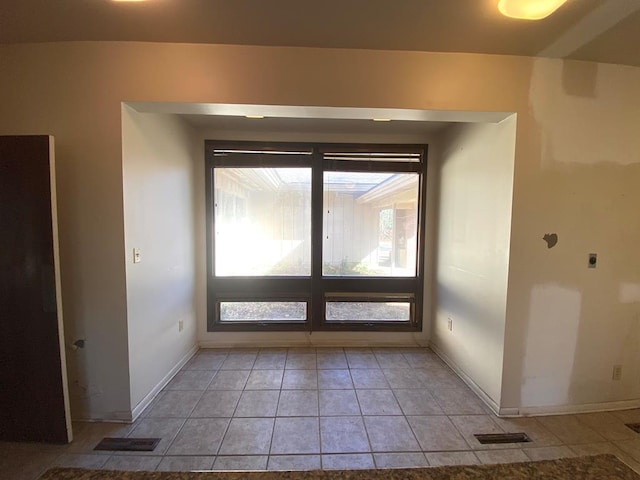 entryway featuring light tile patterned floors