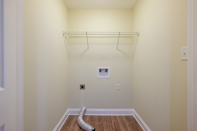 washroom with hookup for a washing machine, hardwood / wood-style floors, and hookup for an electric dryer