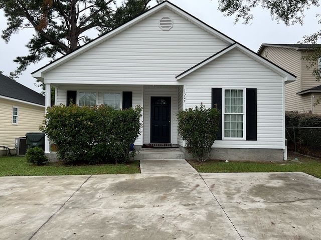 view of front of house with cooling unit