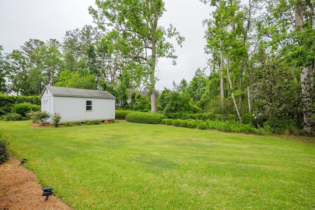 303 Breckenridge Dr, Valdosta, GA 31605 - view of green lawn featuring an outbuilding