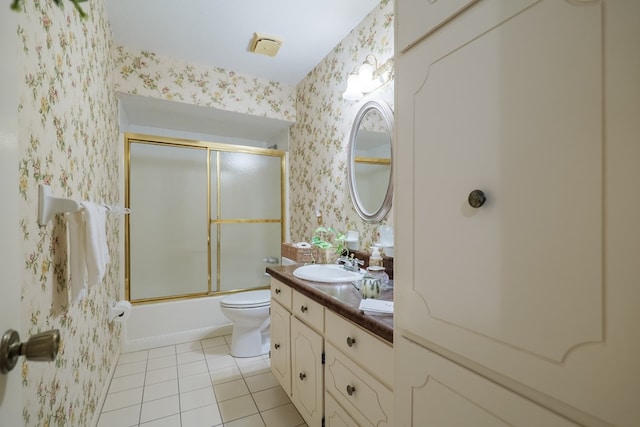 303 Breckenridge Dr, Valdosta, GA 31605 - bathroom featuring wallpapered walls, tile patterned flooring, vanity, and bath / shower combo with glass door
