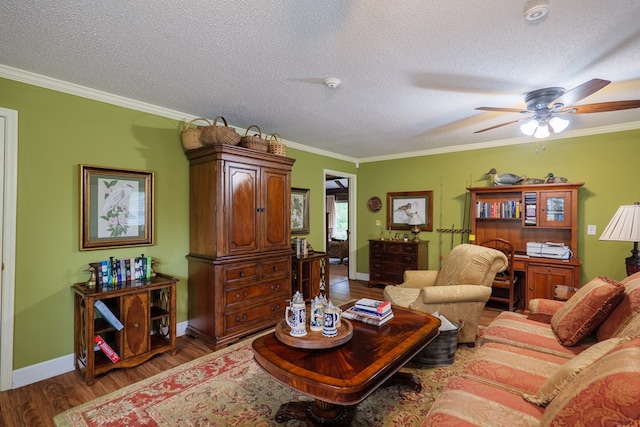 303 Breckenridge Dr, Valdosta, GA 31605 - living area featuring crown molding, wood finished floors, ceiling fan, and a textured ceiling