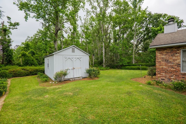 303 Breckenridge Dr, Valdosta, GA 31605 - view of grassy yard with a shed