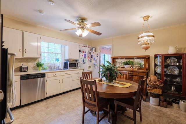 303 Breckenridge Dr, Valdosta, GA 31605 - dining area with plenty of natural light, ceiling fan, ornamental molding, light floors, and a textured ceiling