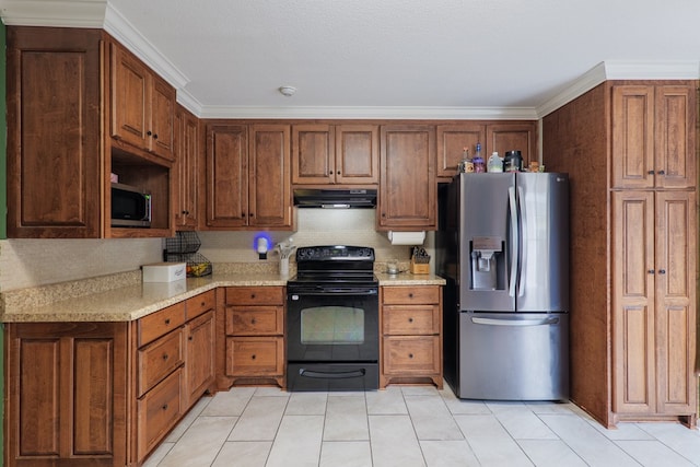 3417 Sussex Dr, Valdosta, GA 31605 - kitchen with appliances with stainless steel finishes, under cabinet range hood, light countertops, decorative backsplash, and light tile patterned flooring