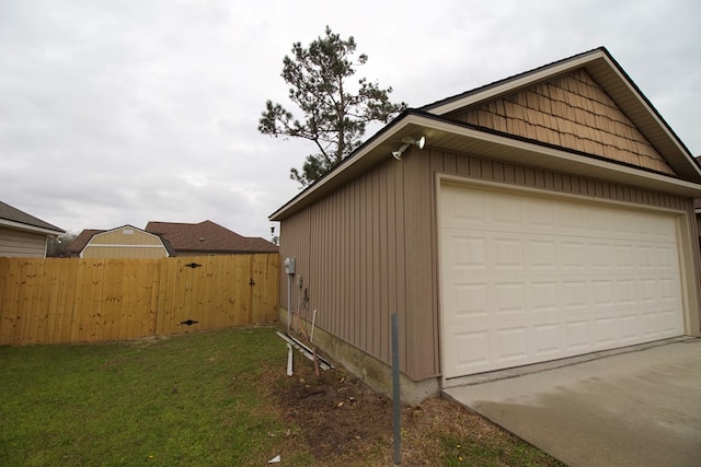 garage featuring fence