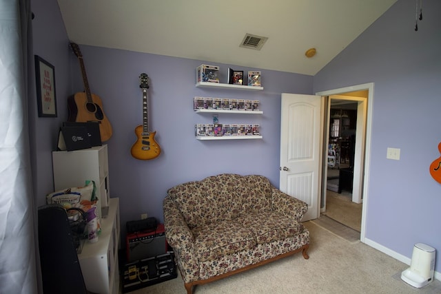 living area featuring carpet, visible vents, vaulted ceiling, and baseboards