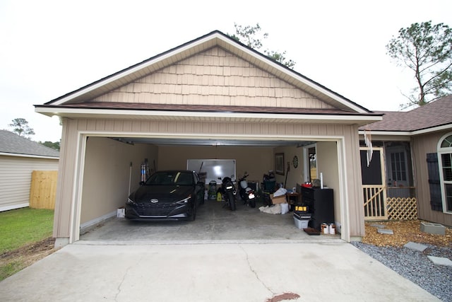 garage featuring driveway