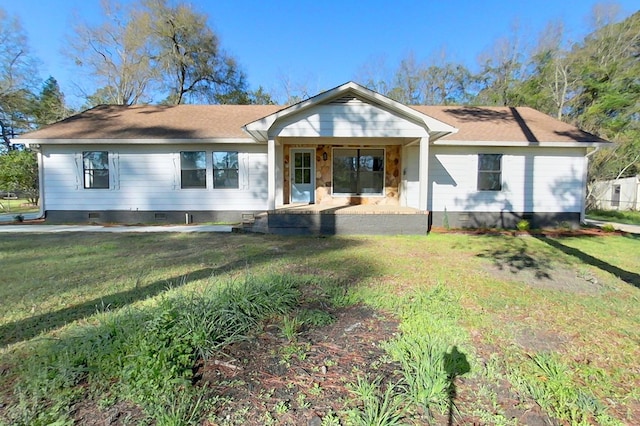 view of front of home with crawl space and a front lawn