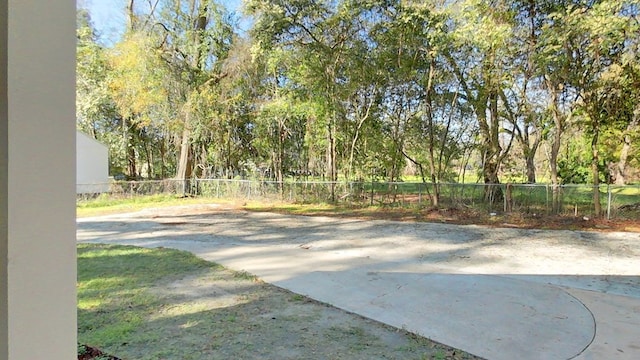 view of patio / terrace featuring fence