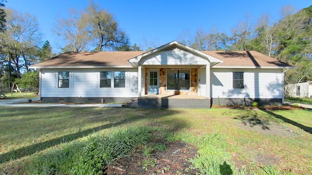 back of property with crawl space and a yard