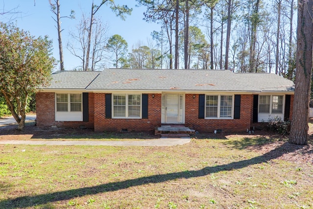 single story home with a front yard