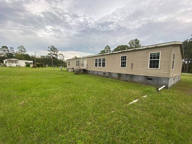 exterior space with a yard