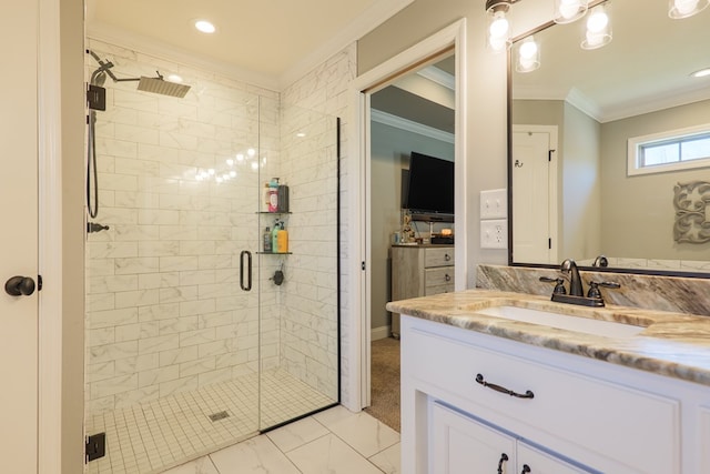 bathroom featuring marble finish floor, a stall shower, vanity, and ornamental molding