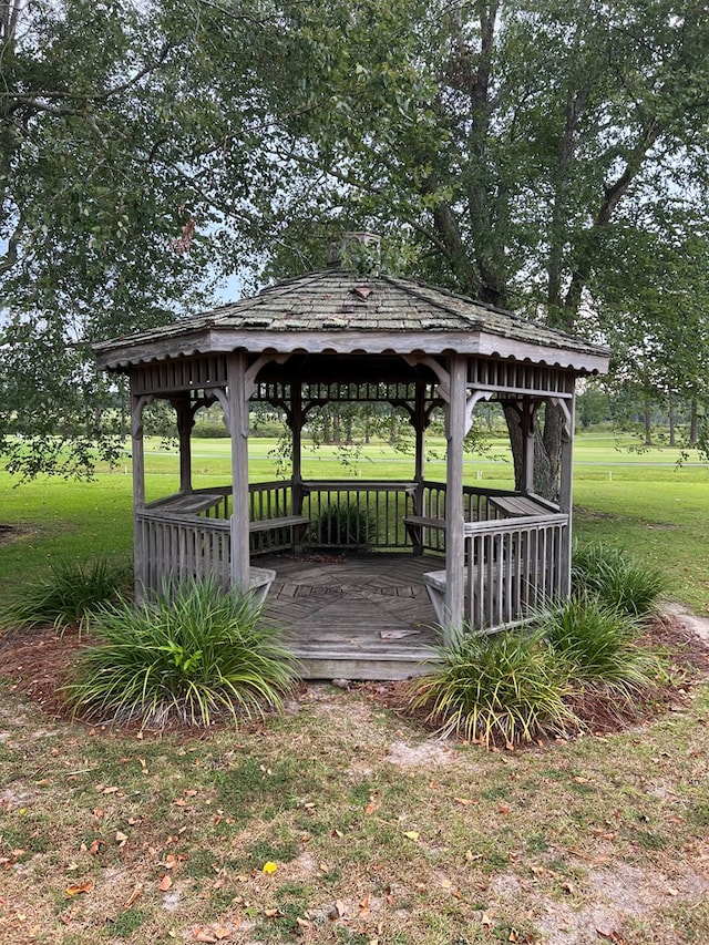 view of home's community featuring a gazebo and a yard