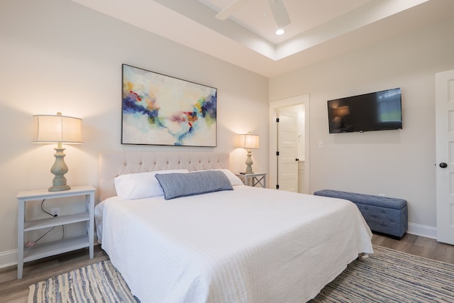 bedroom featuring dark wood-type flooring and ceiling fan