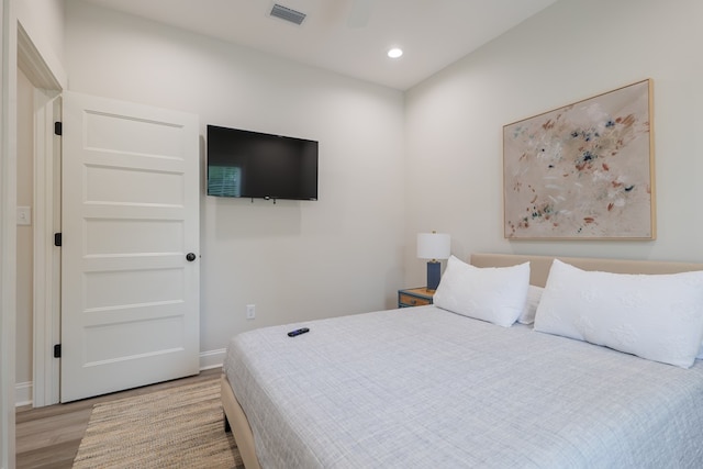 bedroom with light wood-type flooring