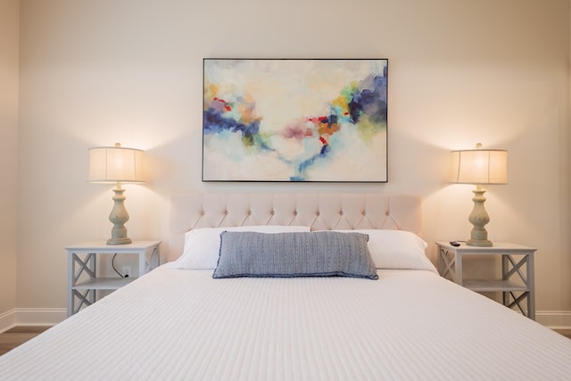 bedroom featuring hardwood / wood-style floors