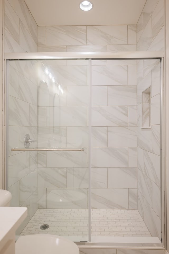 bathroom with vanity and an enclosed shower