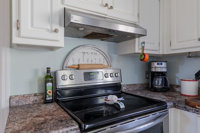 kitchen with white cabinetry and stainless steel electric stove