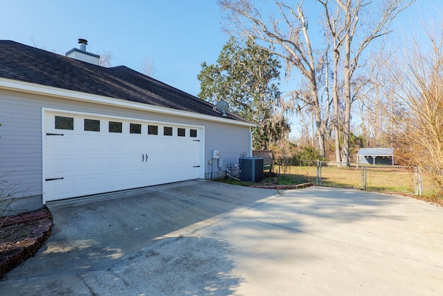 garage featuring central AC unit