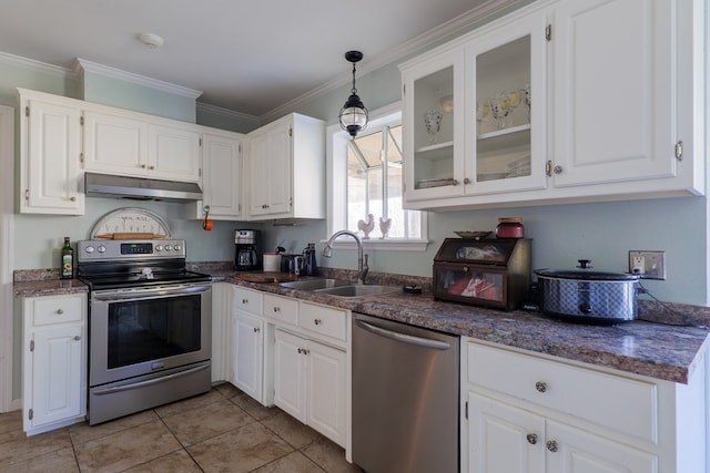 kitchen featuring stainless steel appliances, white cabinetry, sink, and crown molding