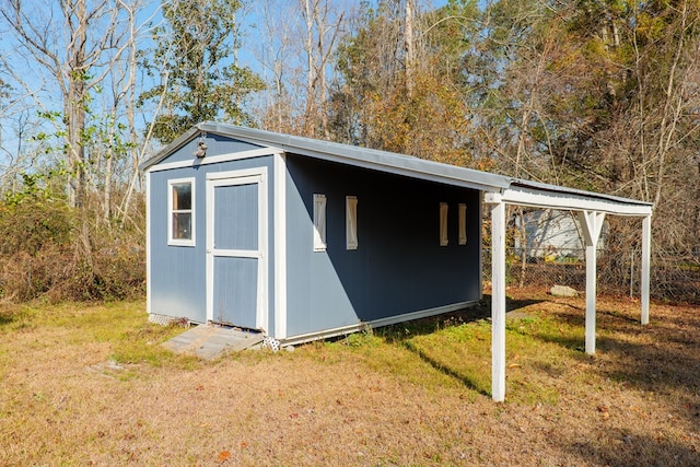 view of outdoor structure with a yard