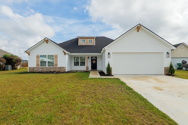 view of front of property featuring central AC, a front yard, and a garage