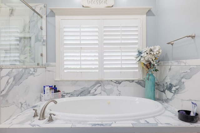 bathroom with a bath