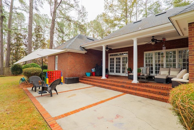 view of patio / terrace featuring ceiling fan, an outdoor hangout area, and french doors